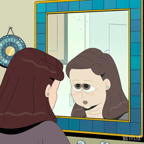 Woman Looking at Herself in Mirror With Netflix