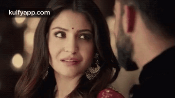 Woman Looking at Man with Bindi