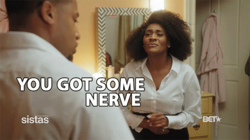 Woman Looking at Mirror Saying You Got Some Nerve