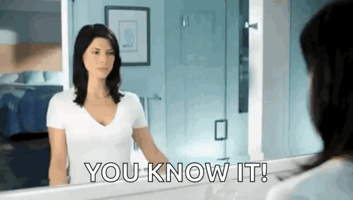 Woman Looking At Mirror Saying You Know It GIF