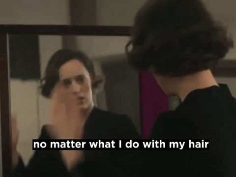 Woman Looking in Mirror It Just Keeps Falling