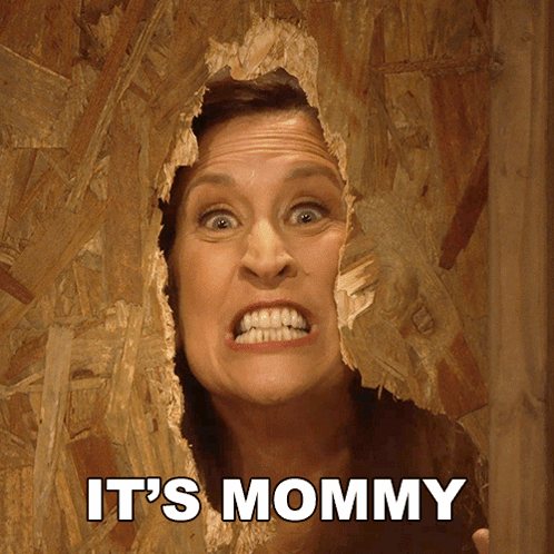 Woman Looking Through Wall Hole Mommy