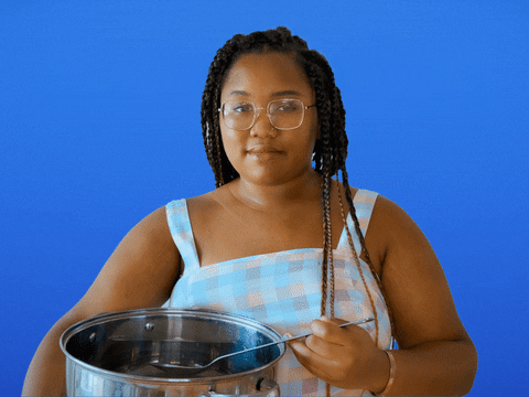 Woman Loves Stir The Pot Quickly GIF