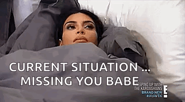 Woman Lying In Bed With Missing You Text GIF