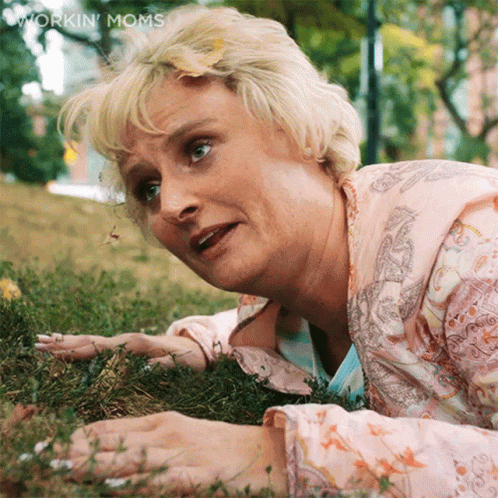 Woman Lying in Grass Workin Moms