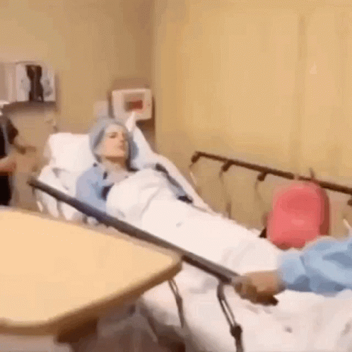 Woman Lying In Hospital Bed GIF