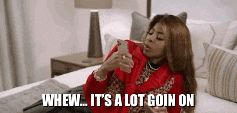 Woman Lying On Bed Looking At Phone GIF