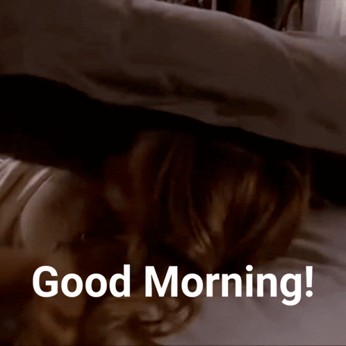 Woman Lying on Bed With Good Morning