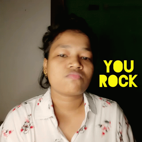 Woman Making Face In Front Of You Rock Sign GIF