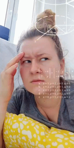 Woman Making Funny Face At Math Problem GIF