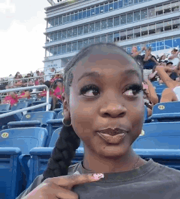 Woman Making Funny Face at Stadium