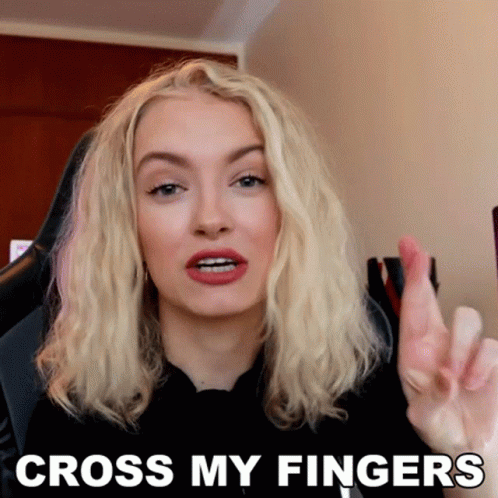 Woman Making Funny Face Cross My Fingers GIF