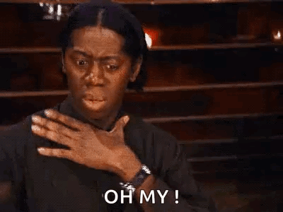 Woman Making Funny Face Holding Chest GIF