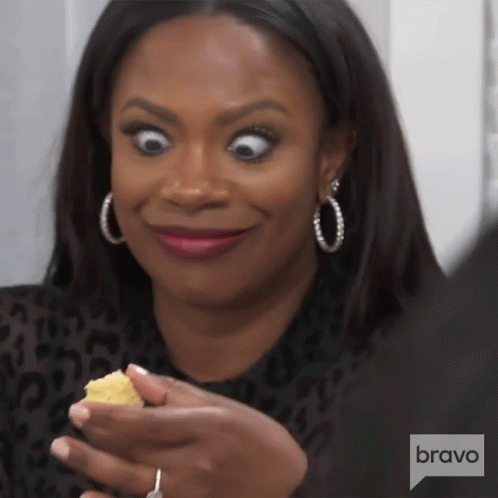 Woman Making Funny Face Holding Food Bravo