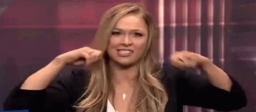 Woman Making Funny Face Holding Ponytail