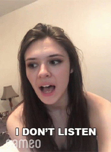 Woman Making Funny Face I Don't Listen GIF