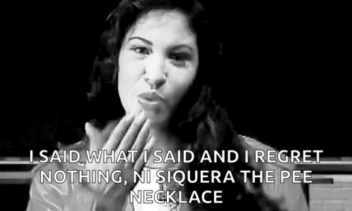 Woman Making Funny Face in Black and White Photo With Necklace