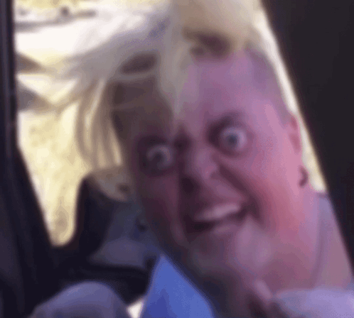 Woman Making Funny Face in Car