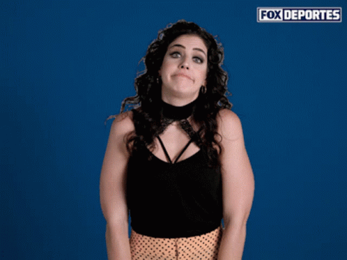 Woman Making Funny Face in Front of Fox Deportes