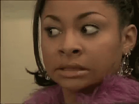 Woman Making Funny Face in Pink Fur Coat