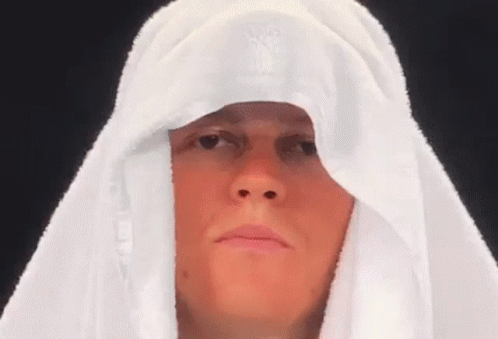 Woman Making Funny Face In Suit And Tie GIF