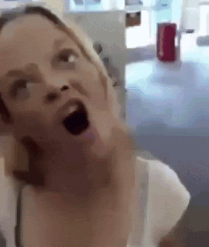 Woman Making Funny Face Mouth Wide Open