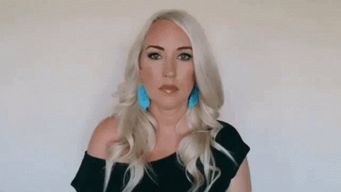 Woman Making Funny Face Pointing At Nose Saying Boo Hoo GIF