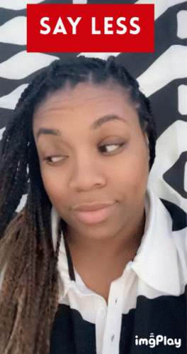 Woman Making Funny Face Say Less Sign