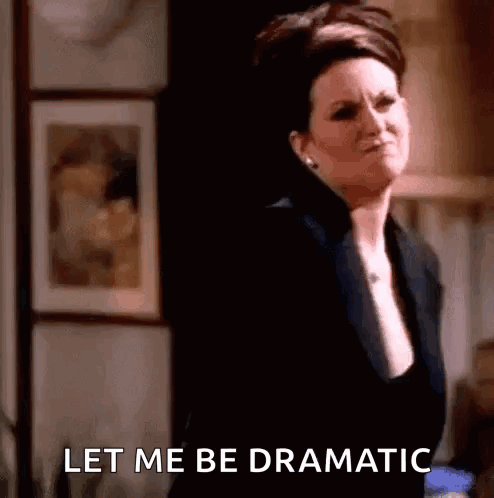 Woman Making Funny Face Saying Let Me Be Dramatic