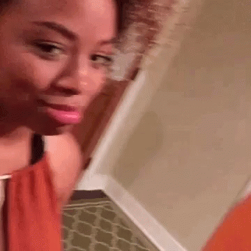 Woman Making Funny Face with Brush