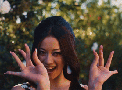 Woman Making Funny Face with Hands