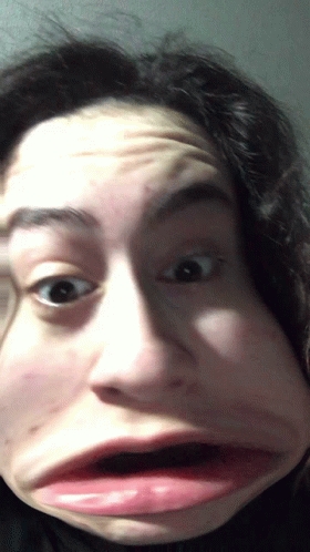 Woman Making Funny Face With Mouth Open GIF
