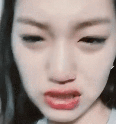 Woman Making Funny Face With Tongue Out