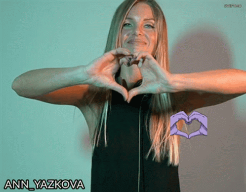 Woman Making Heart Shape Ann Yazkova