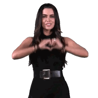 Woman Making Heart Shape in Front of Fox Deportes Logo