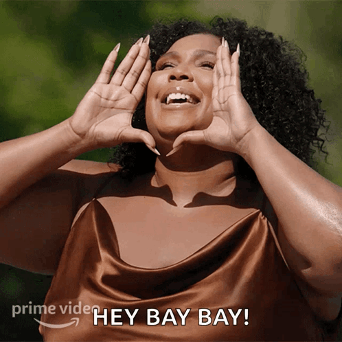 Woman Making Heart Shape Saying Hey Bay Bay