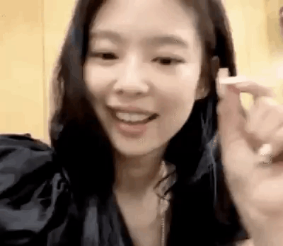 Woman Making Heart Shape With Fingers