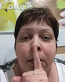 Woman Making Shhh Sign GIF