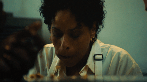 Woman Munching Delicious Food GIF