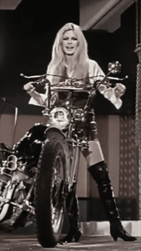 Woman Next to Motorcycle With Number 8