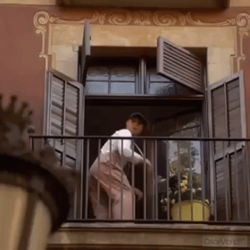 Woman On Balcony With Open Shutters Creepy GIF