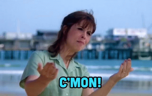 Woman On Beach With Hands In Air Says C Mon