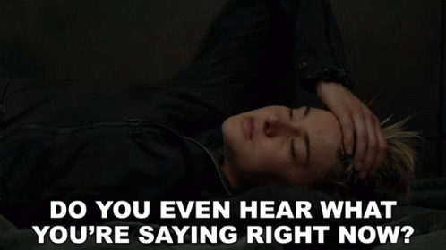 Woman On Bed Hand On Forehead Saying Do You Even Hear GIF