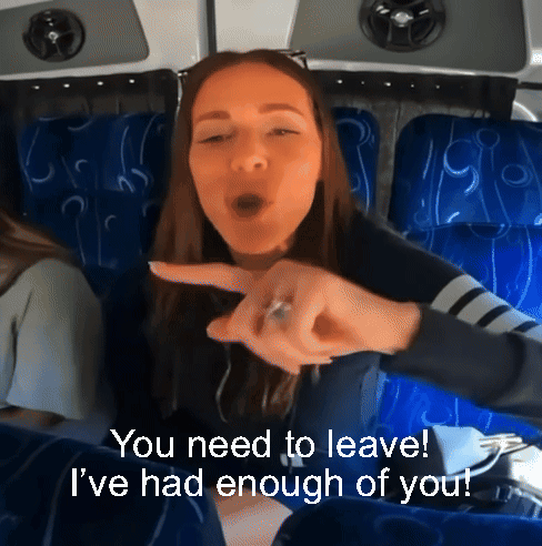 Woman on Bus Saying You Need to Leave
