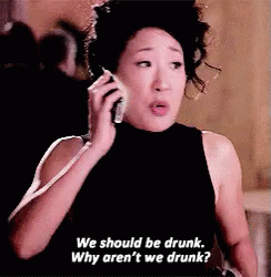 Woman on Cell Phone Saying We Should Be Drunk