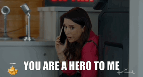 Woman On Cell Phone Saying You Are A Hero To Me GIF