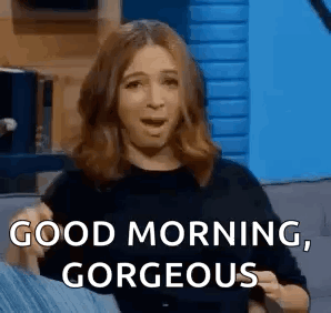 Woman On Couch Saying Good Morning Gorgeous GIF