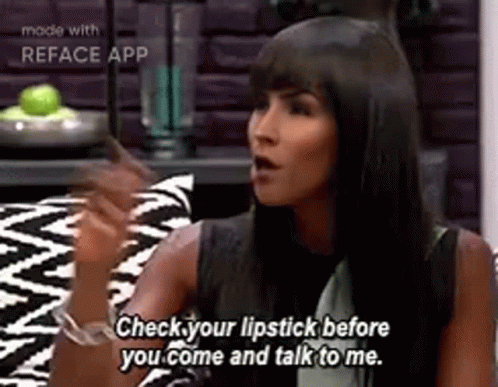 Woman On Couch Talking Wearing Lipstick GIF