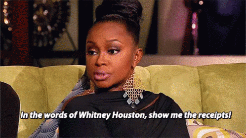 Woman on Green Couch Saying Show Me the Receipts