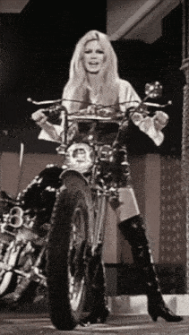 Woman On Motorcycle With License Plate Saying A GIF